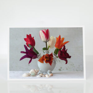 tulips in a tulipiere with shells